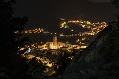 High angle view of illuminated buildings at night