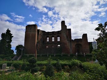 Low angle view of old building against sky