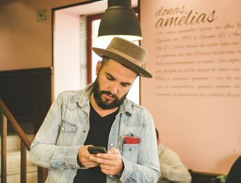 Young man using mobile phone