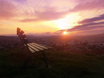 Scenic view of landscape against sky during sunset