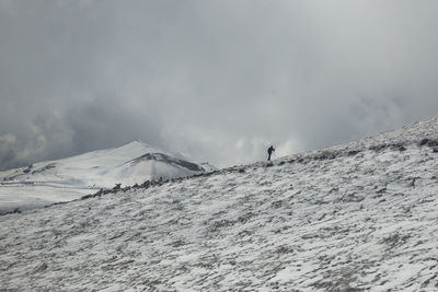 Scenic view of snowcapped mountain against sky