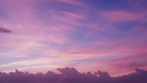 Low angle view of dramatic sky during sunset