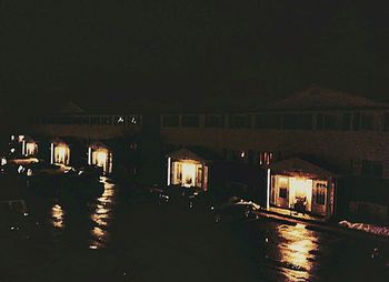 Illuminated fountain at night