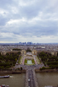 High angle view of cityscape against cloudy sky