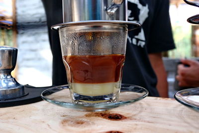 Close-up of coffee served on table