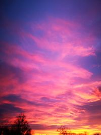 Low angle view of dramatic sky during sunset