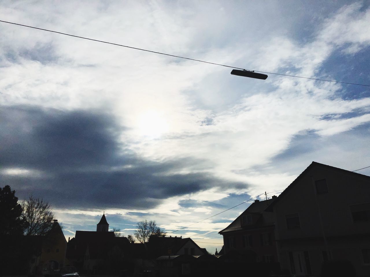 LOW ANGLE VIEW OF BUILDINGS AGAINST SKY