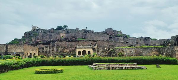 View of old ruins against sky golkonda fort