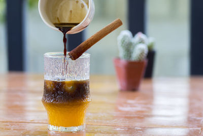 Close-up of beer glass on table