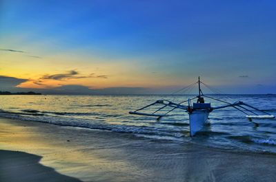 Scenic view of sea at sunset