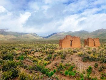 View of landscape against cloudy sky