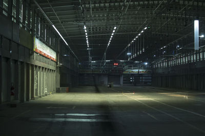 Empty road in illuminated building
