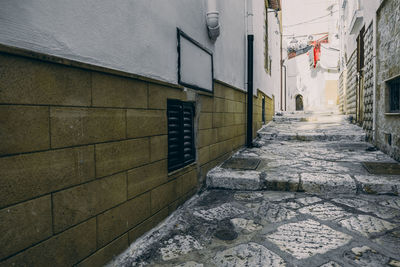 Narrow alley amidst buildings