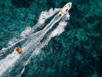 High angle view of people on boat in sea