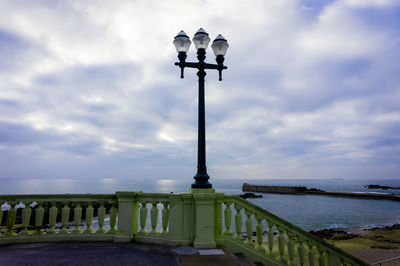 Lamp post against sky