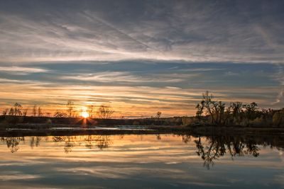 Scenic view of sunset over water