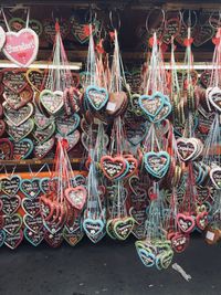 Clothes hanging on rope for sale at market