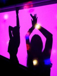 Blurred motion of people in amusement park