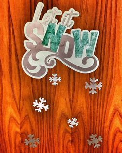 Close-up of text on wood