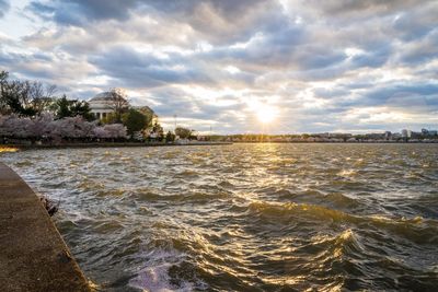 Scenic view of sea against cloudy sky