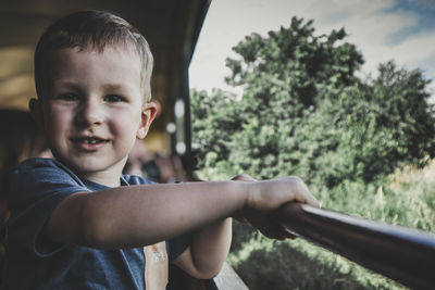 Portrait of boy in car