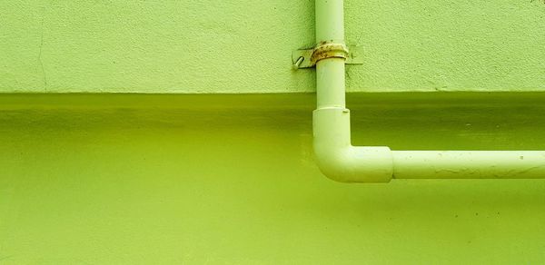 Close-up of pipe on wall