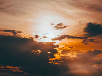 Low angle view of dramatic sky during sunset