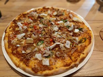 High angle view of pizza on table