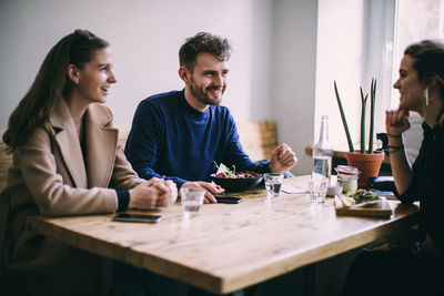 Group of people sitting at table