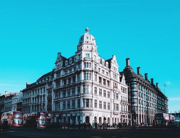 Low angle view of historical building against blue sky