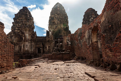 Old ruins of building against sky