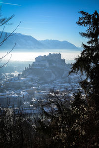 Scenic view of mountains against sky during winter