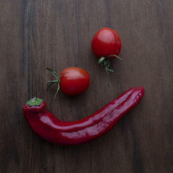 High angle view of red chili peppers on table