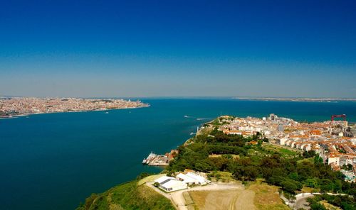 High angle view of town by sea