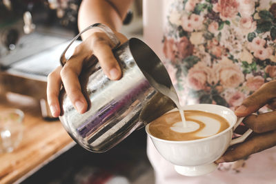 Close-up of coffee cup on table