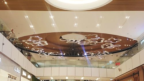 Low angle view of illuminated ceiling