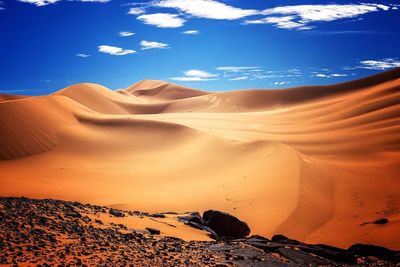 Scenic view of desert against sky