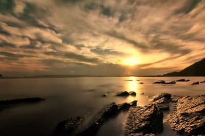 Scenic view of sea against sky during sunset