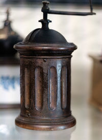 Close-up of old lantern on table