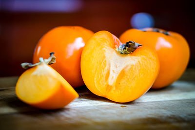 Close-up of pumpkins on orange
