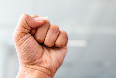 Close-up of person holding hands