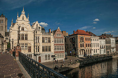 St. michael bridge and gothic buildings in ghent. a city full of gothic buildings in belgium.