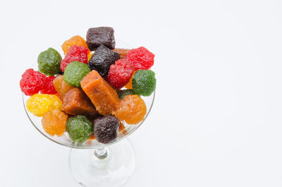 Close-up of fruits against white background