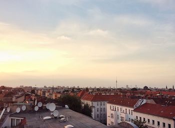 High angle view of townscape against sky during sunset