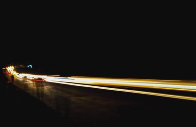 Light trails on road at night
