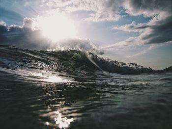 Surface level of sea against sky