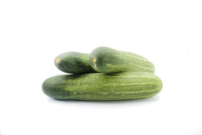 Close-up of fruits against white background