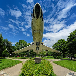 Sculpture in park against sky