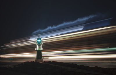 Light trails against sky at night