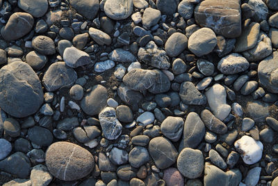 Full frame shot of pebbles on beach